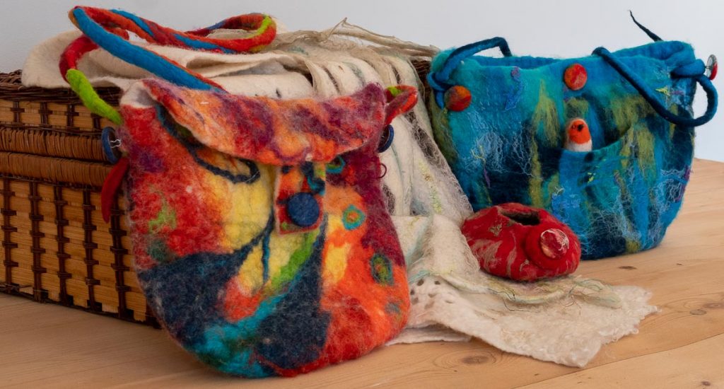 Felted items can be wearable or to adorn the home.